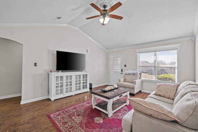 living area with visible vents, lofted ceiling, wood finished floors, arched walkways, and baseboards