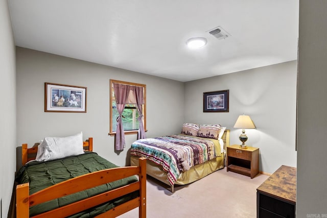 bedroom featuring visible vents and carpet floors