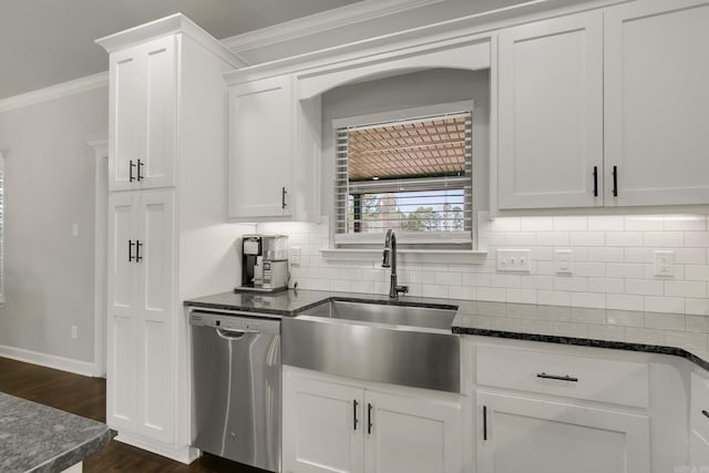 kitchen with dishwasher, white cabinets, ornamental molding, and a sink