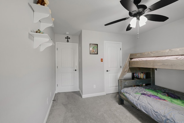 bedroom with baseboards, carpet floors, and ceiling fan