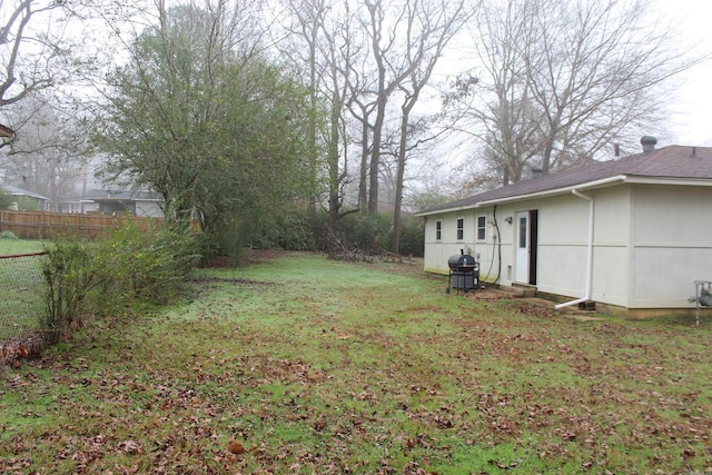 view of yard featuring fence