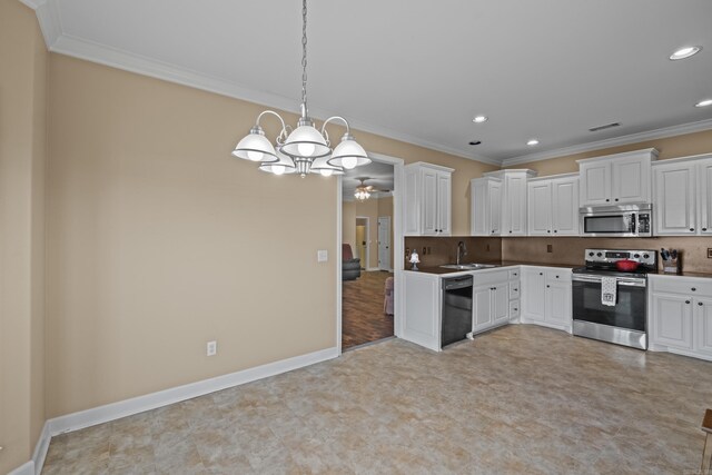 kitchen featuring baseboards, ornamental molding, decorative backsplash, white cabinets, and stainless steel appliances