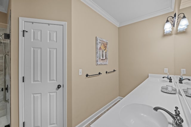 full bath featuring a sink, an inviting chandelier, a stall shower, and ornamental molding