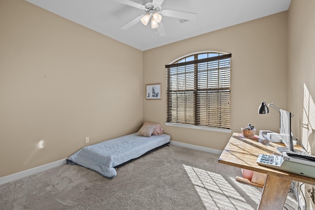 bedroom featuring baseboards, carpet, and ceiling fan