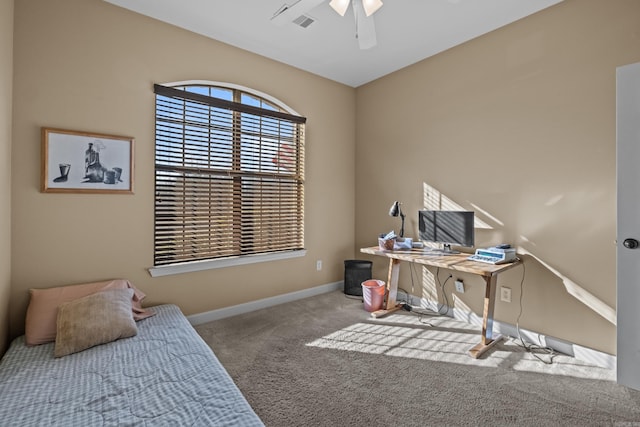 carpeted bedroom with baseboards and ceiling fan