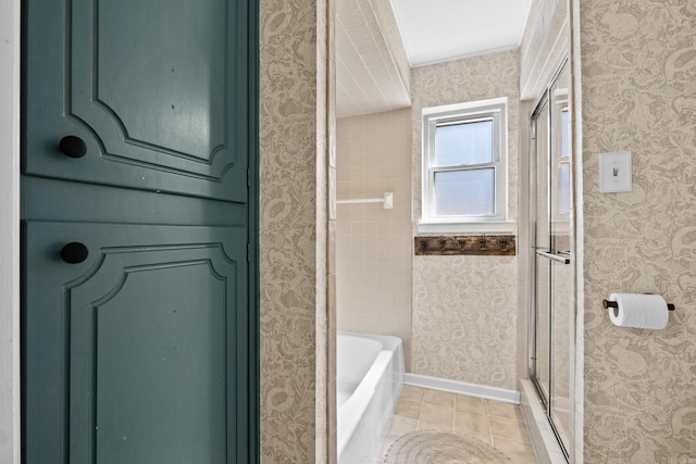 bathroom featuring a shower with door, tile patterned flooring, wallpapered walls, and a bath