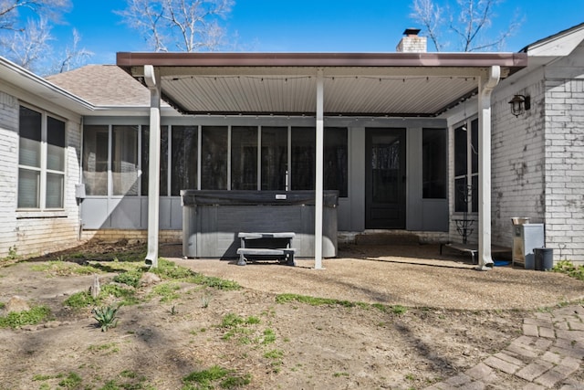 exterior space featuring a sunroom