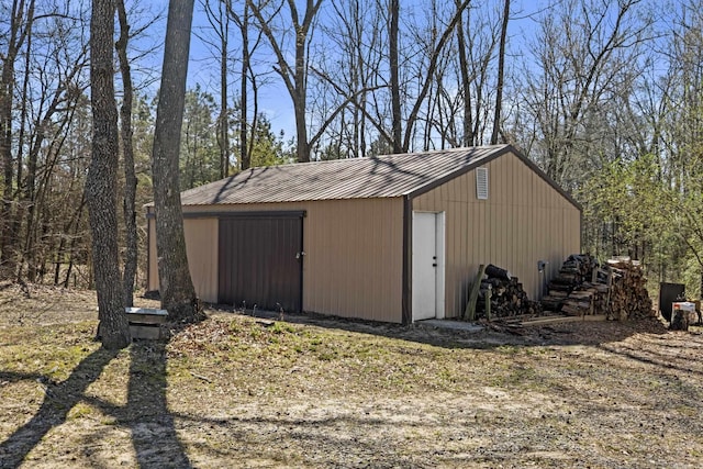 view of outbuilding featuring an outdoor structure