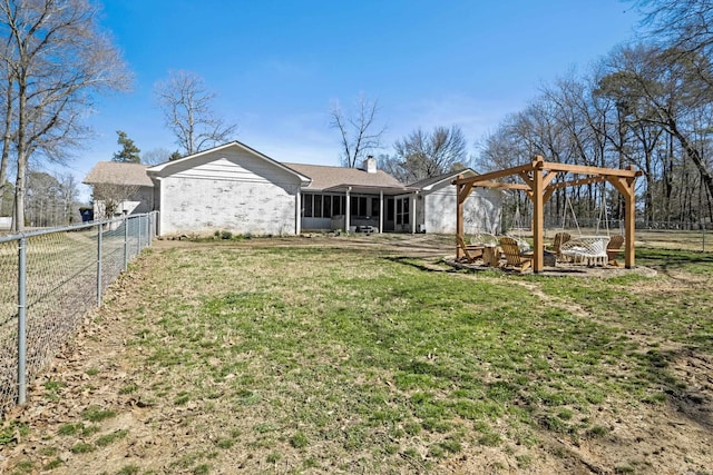 exterior space with fence and a sunroom