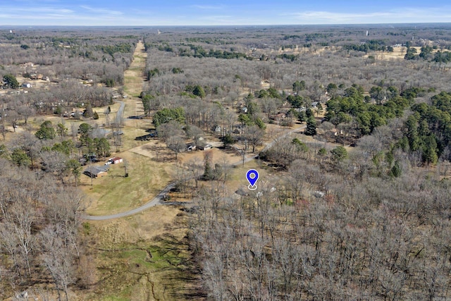 aerial view with a wooded view