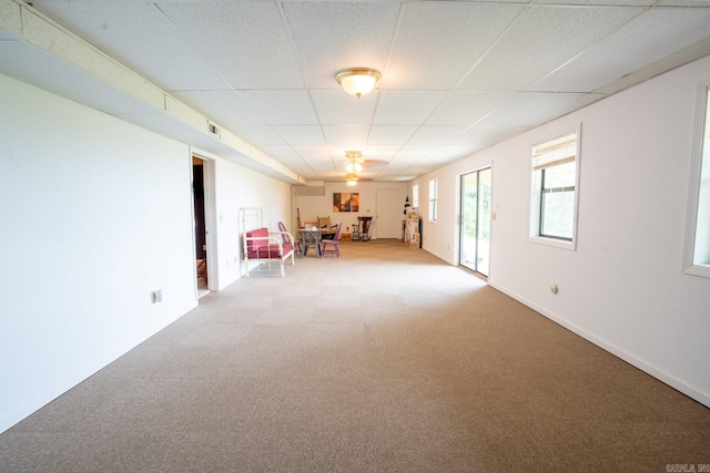 playroom with a drop ceiling, baseboards, light colored carpet, and visible vents