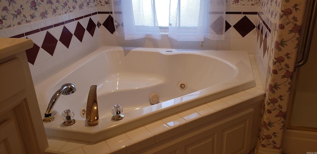 full bathroom with wallpapered walls and a jetted tub