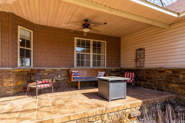 view of patio with ceiling fan