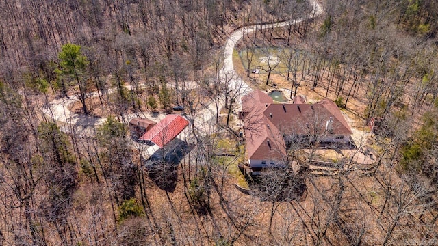 aerial view featuring a view of trees