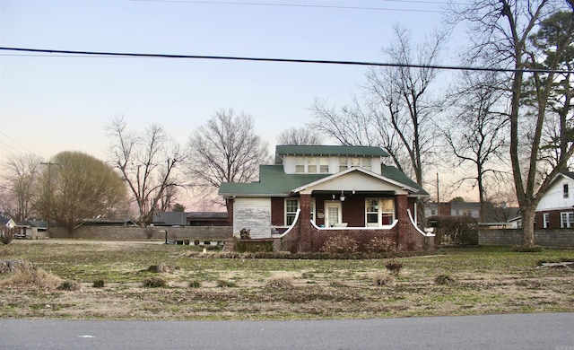 view of front of home with brick siding