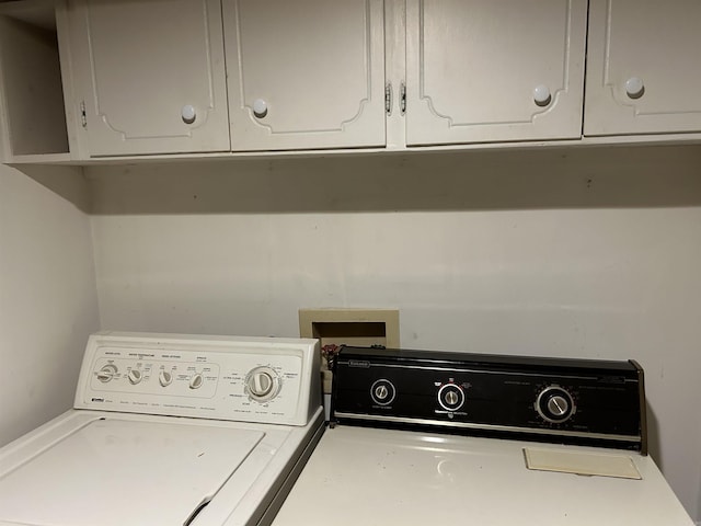 washroom featuring laundry area and separate washer and dryer