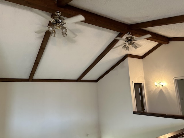 details with beam ceiling, a ceiling fan, and a textured ceiling