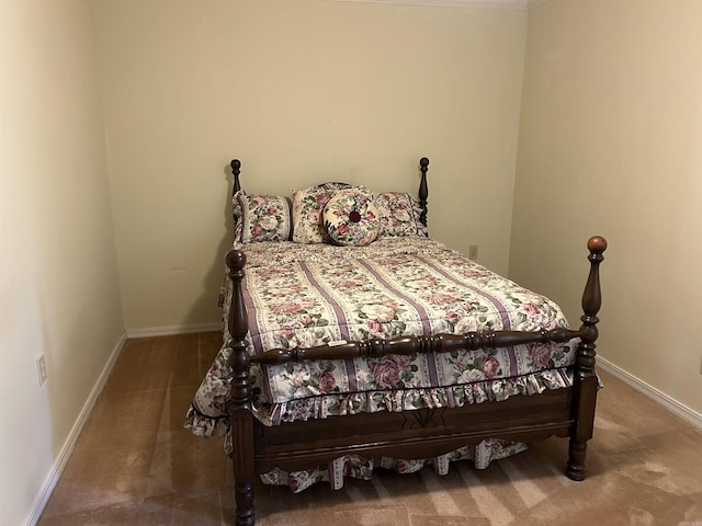 carpeted bedroom with baseboards