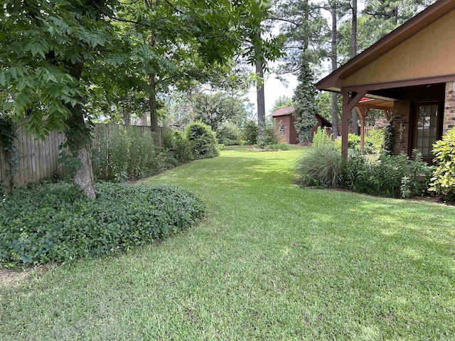 view of yard with fence