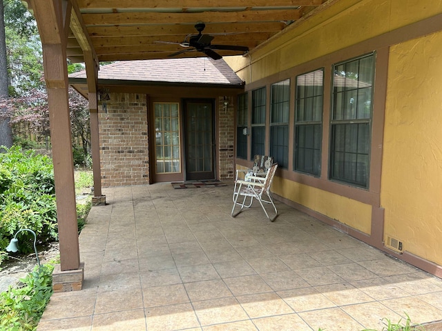 view of patio with visible vents and ceiling fan