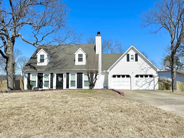 cape cod-style house featuring a front yard, fence, driveway, a chimney, and a garage