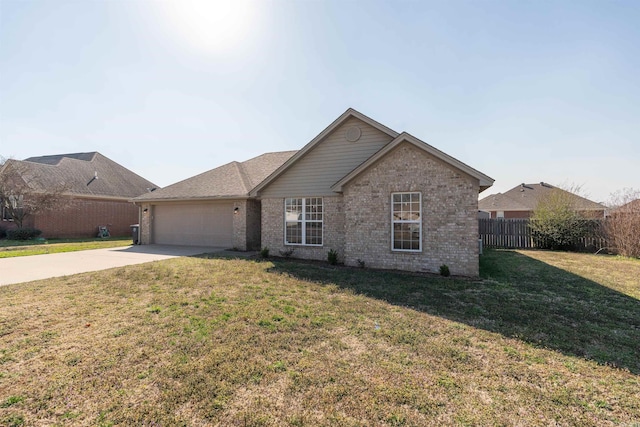 ranch-style home with brick siding, a front lawn, fence, a garage, and driveway