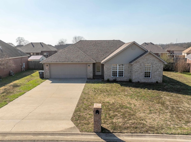 view of front of property with brick siding, a shingled roof, concrete driveway, a front yard, and a garage