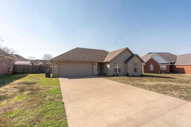 ranch-style house featuring a garage, driveway, a front yard, and fence