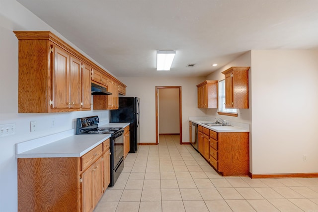 kitchen with black appliances, under cabinet range hood, a sink, light countertops, and baseboards