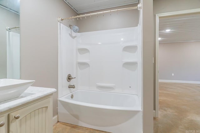 bathroom featuring vanity and  shower combination