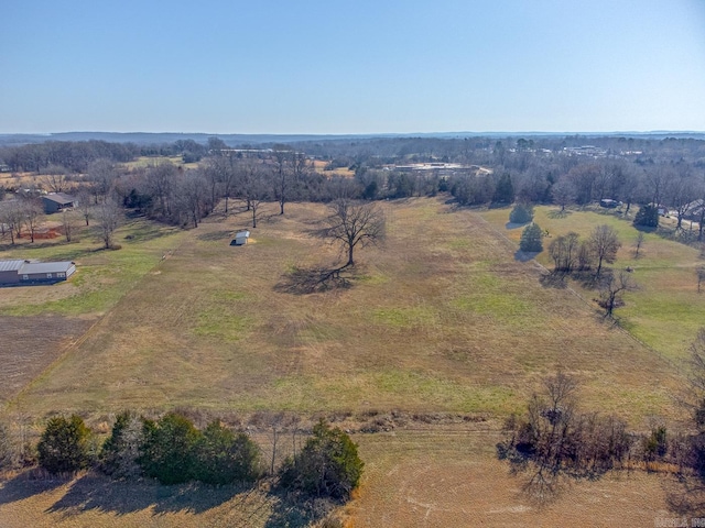 birds eye view of property featuring a rural view