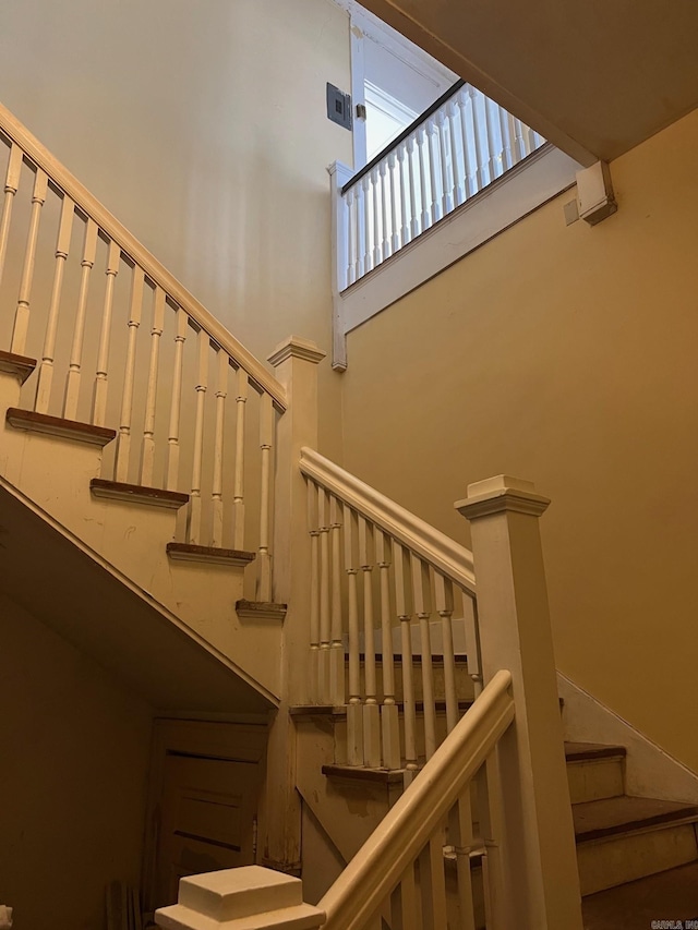 stairs with a high ceiling