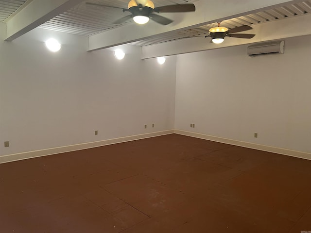 basement featuring a ceiling fan, a wall mounted AC, and baseboards