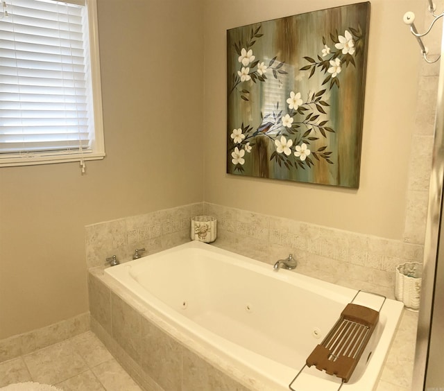 bathroom featuring tile patterned flooring and a jetted tub