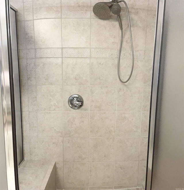 bathroom with a stall shower