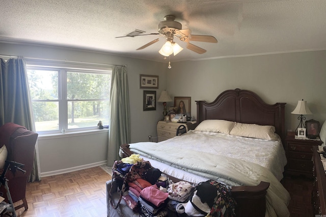 bedroom featuring a textured ceiling, crown molding, baseboards, and a ceiling fan