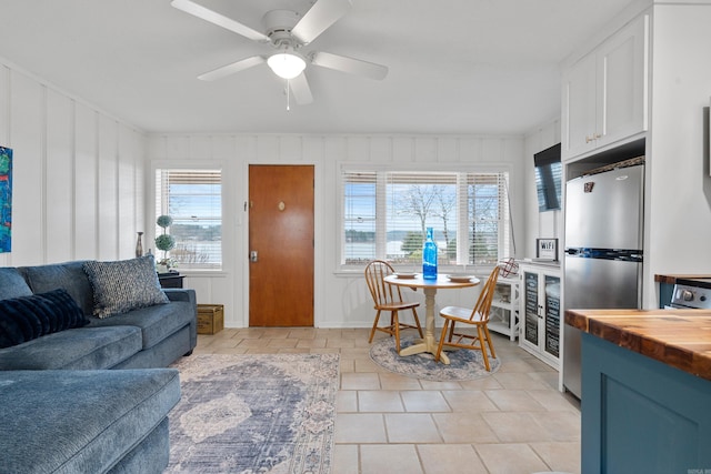 living room with a ceiling fan