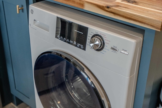 washroom with washer / dryer and laundry area