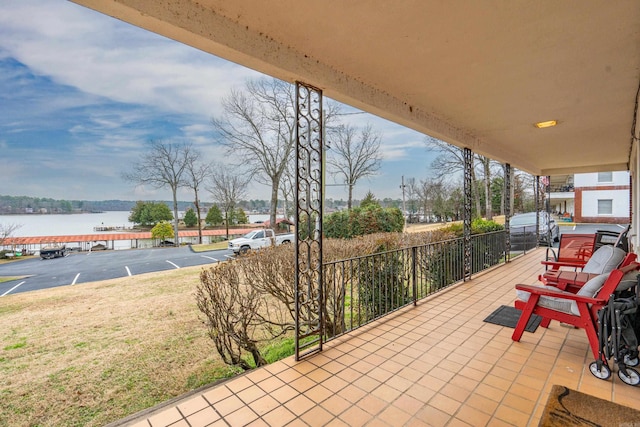 view of patio / terrace featuring a water view