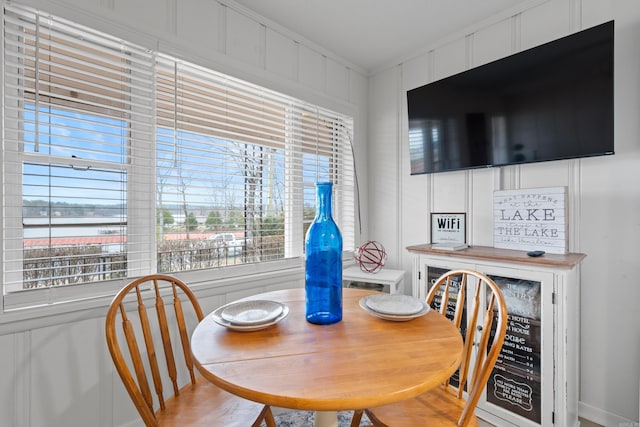 dining room featuring ornamental molding