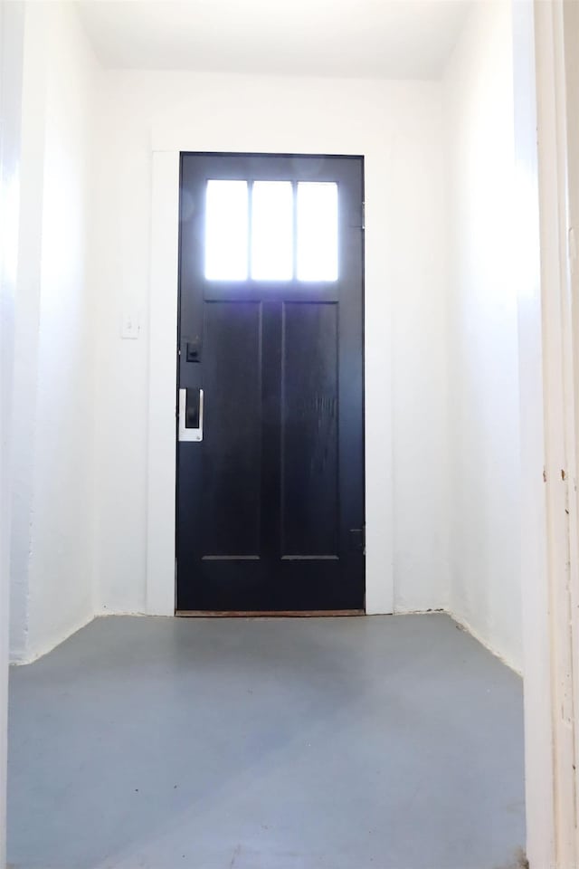 foyer entrance with finished concrete flooring