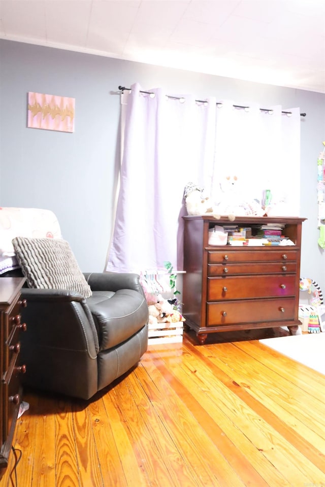 sitting room featuring light wood-style flooring