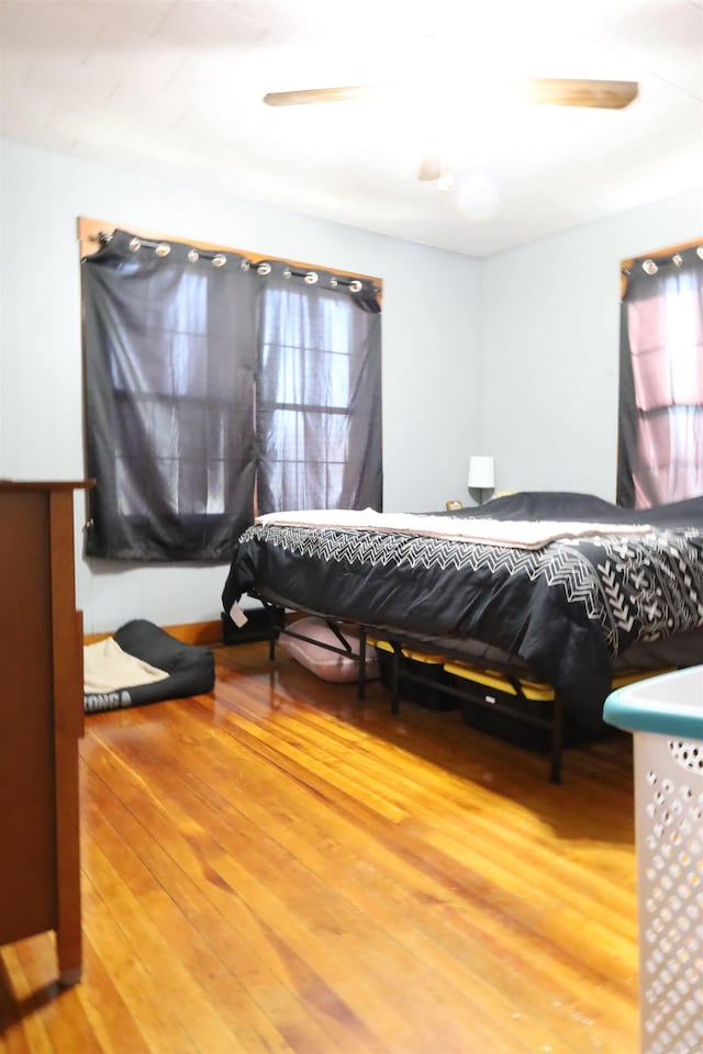 bedroom with wood finished floors