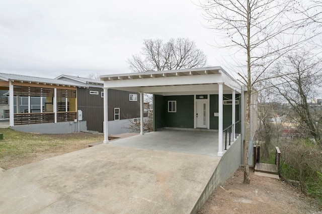 exterior space featuring concrete driveway