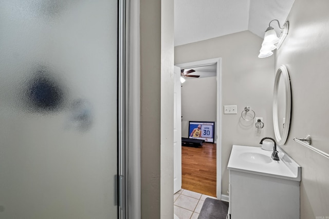 bathroom featuring tile patterned floors, a stall shower, vanity, and ceiling fan