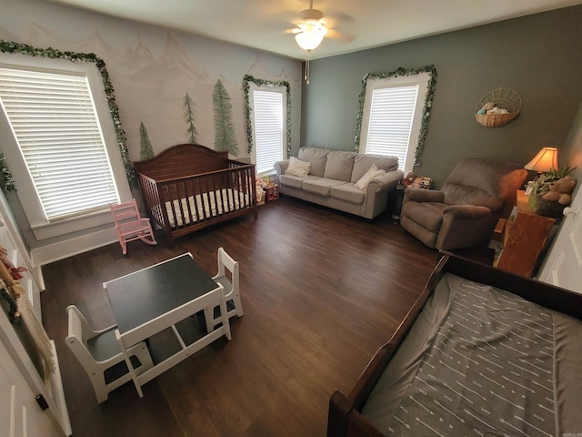 bedroom with a ceiling fan and wood finished floors