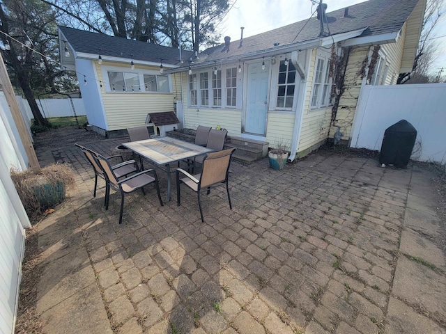 view of patio featuring a fenced backyard and entry steps