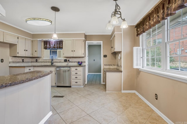 kitchen with light tile patterned floors, ornamental molding, hanging light fixtures, dishwasher, and tasteful backsplash