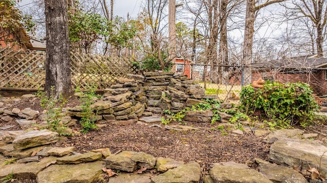 view of yard with fence