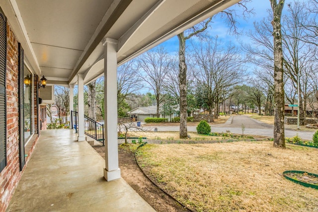 view of yard with a porch